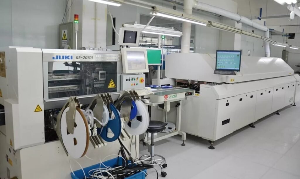 Automated electronics assembly line machine